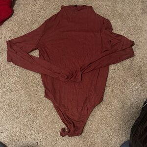 Shinestar Rust Long Sleeve Bodysuit